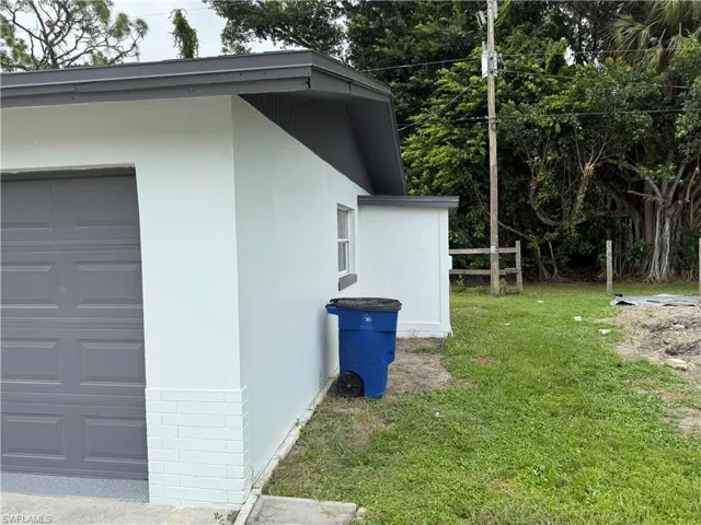View of home's exterior featuring a garage and stucco siding