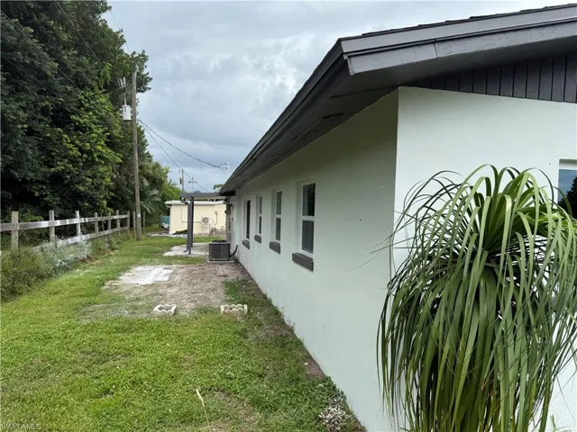 View of property exterior featuring stucco siding