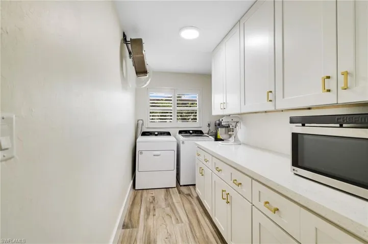 Quartz counter tops and ample cabinetry