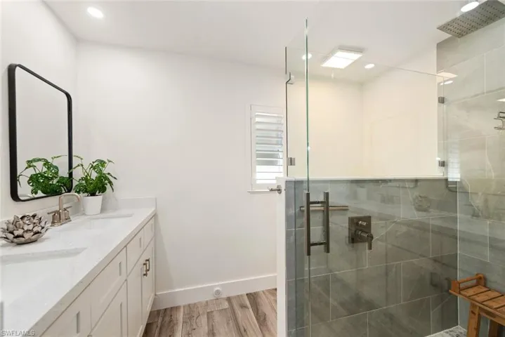 dual shower heads/rain shower/ floor to ceiling tile