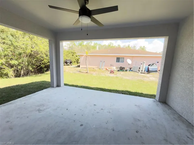View of patio with a ceiling fan