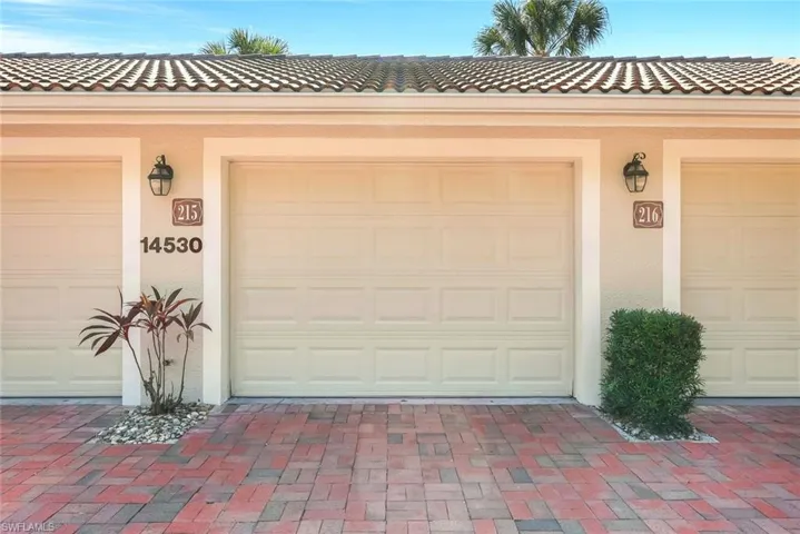 View of single car detached garage.