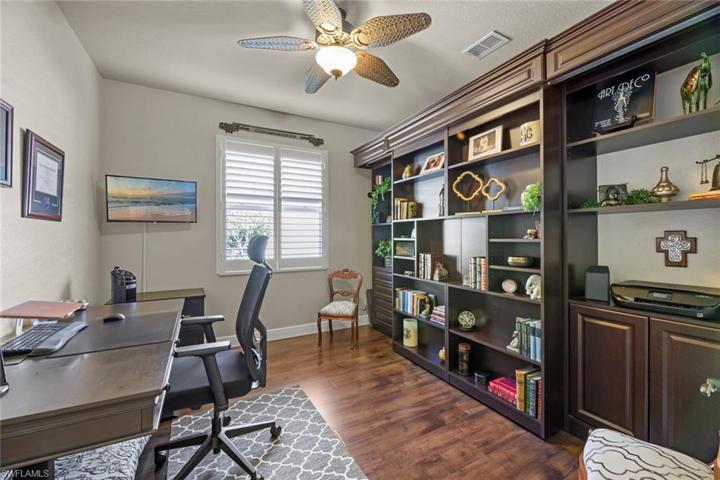 Den/office w/Murphy bed behind shelving