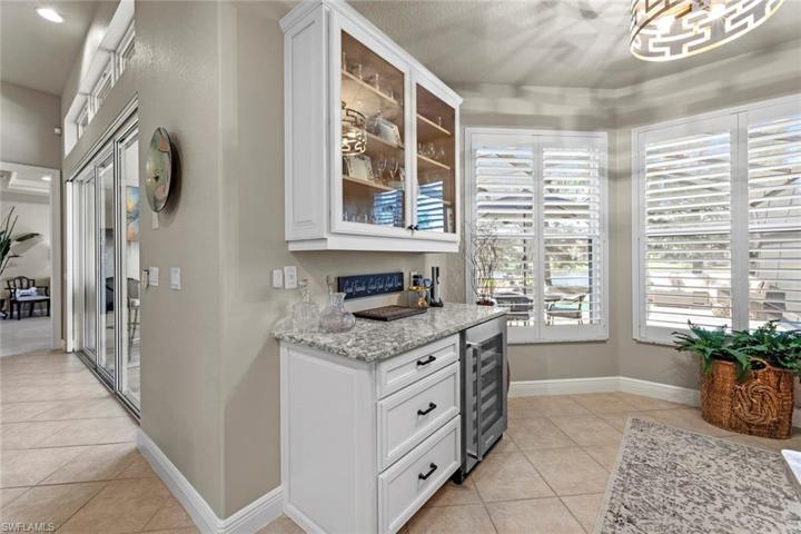 Breakfast nook w/additional cabinetry and wine fridge