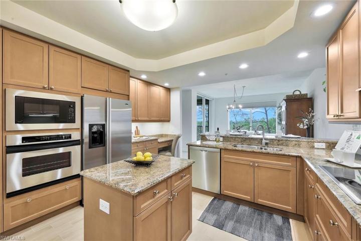 Spacious kitchen with stainless appliances and granite counter tops