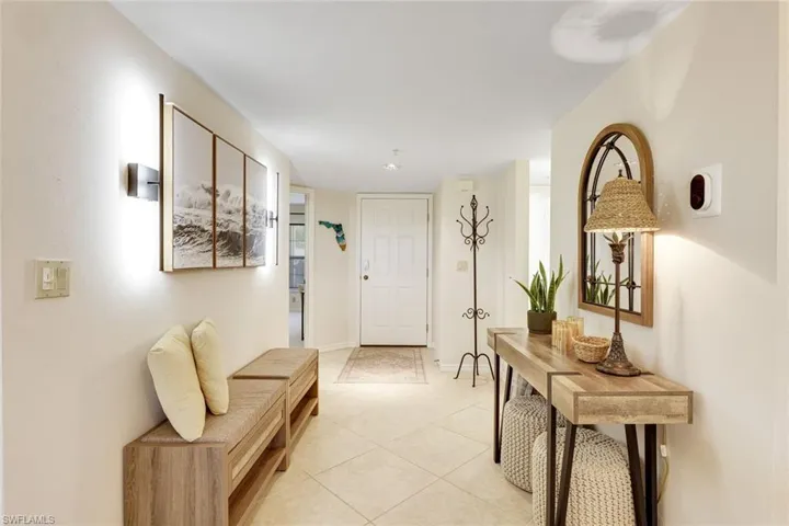 View of front door from living area.