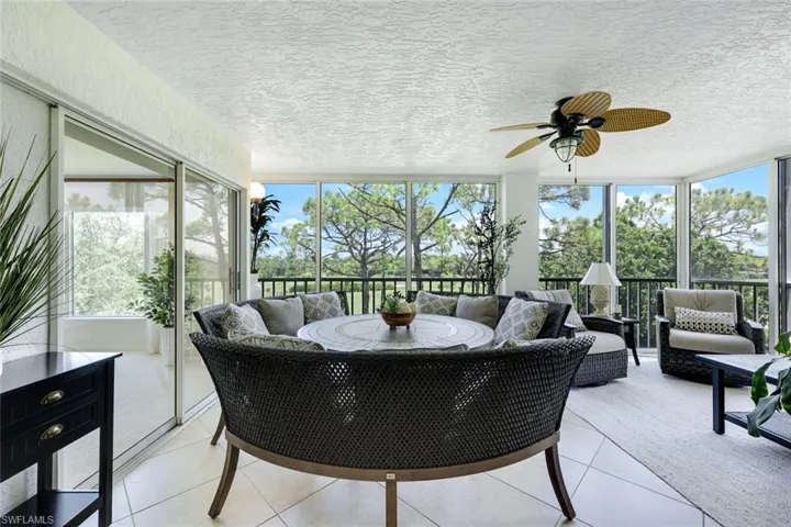 Enjoy morning coffee or evening drinks on this private lanai—Florida living at its best.