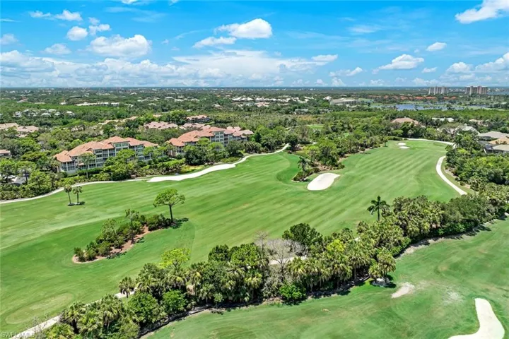 Gorgeous aerial view of the nearby fairways and community layout.