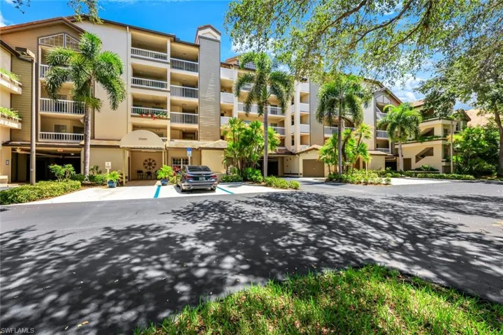 Welcome to Wedgewood at Bonita Bay—lush landscaping and  beautifully maintained buildings.
