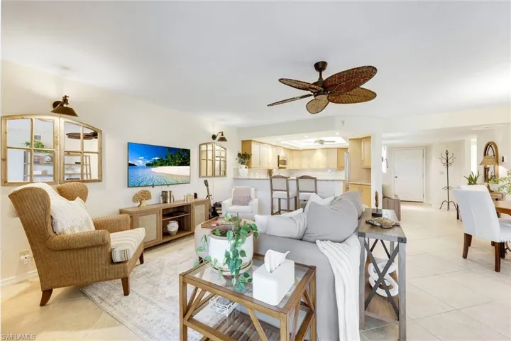Plenty of room to gather or to unwind in this bright, airy main space with a classic Florida feel.