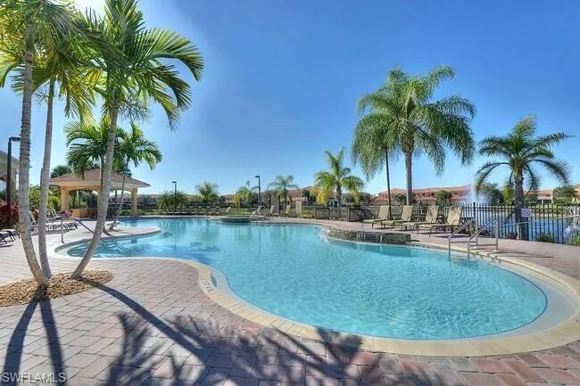 Community pool with a patio and a gazebo