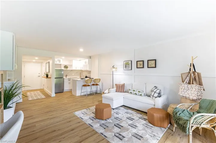 Living area featuring light wood-style floors