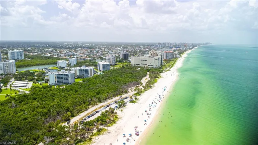 View of urban area with expansive beach