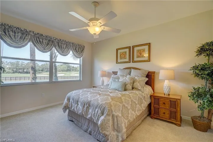 Main Bedroom overlooking lake and golf course