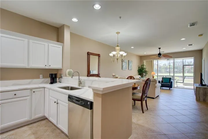 Updated kitchen with white cabinets and new countertop