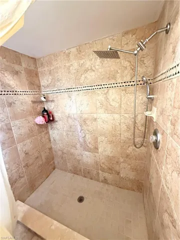 Bathroom featuring a shower stall