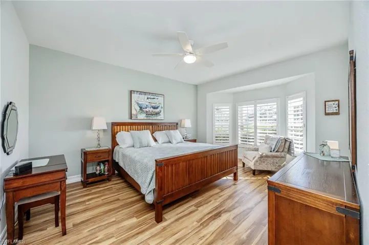 Bedroom featuring light wood-style floors and ceiling fan