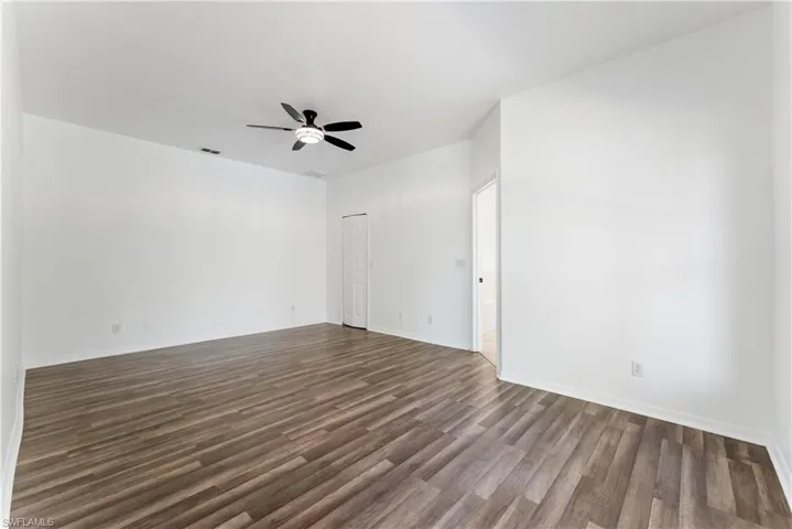 Owner suite, walk in closet, bath entrance on right.