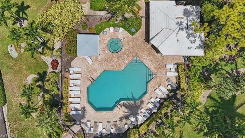 Aerial view of property's location featuring a pool