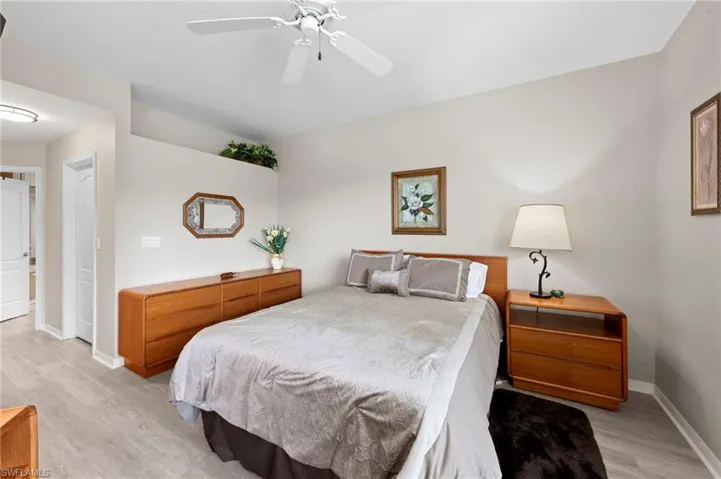 Bedroom featuring light wood-style flooring and ceiling fan