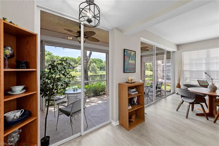 Doorway to outside featuring wood finished floors