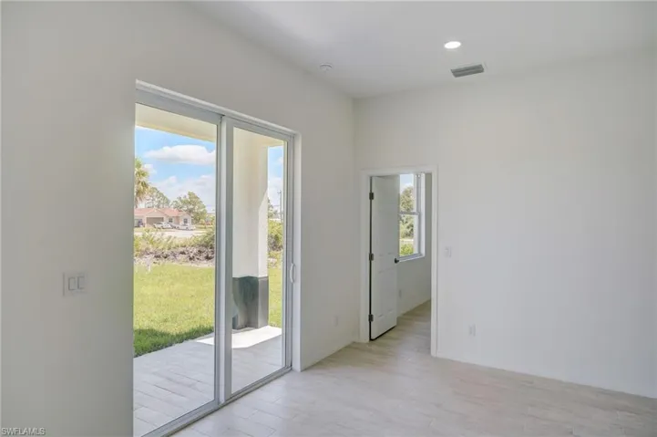 Spare room with light hardwood / wood-style flooring
