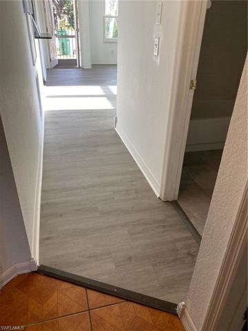 hallway with new gray vinyl plank flooring