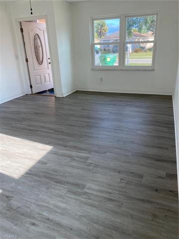 with new gray vinyl plank flooring