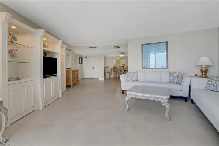Dining area featuring a tray ceiling