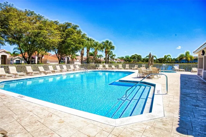 Community pool featuring a patio area