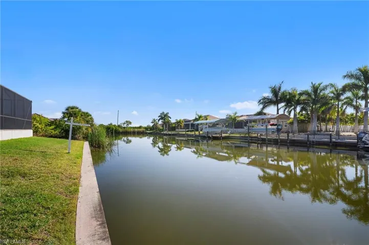 Water view with a dock