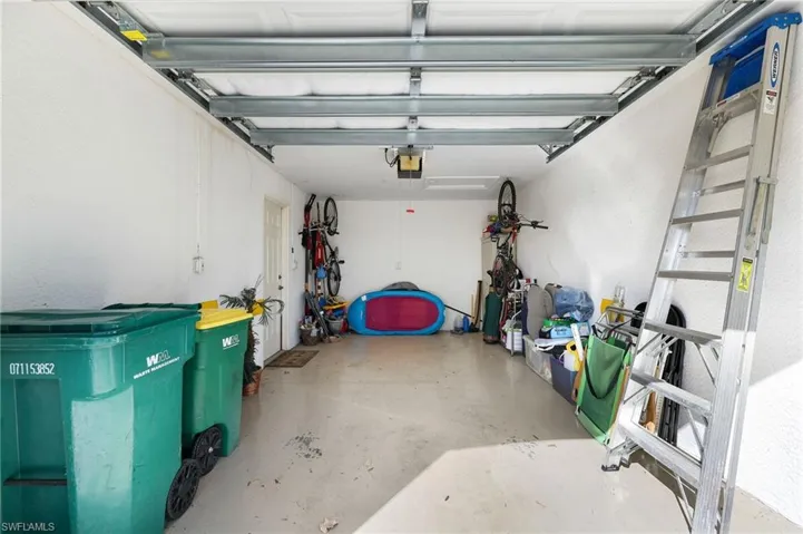 This one-car garage provides a secure, enclosed space for parking and additional storage.