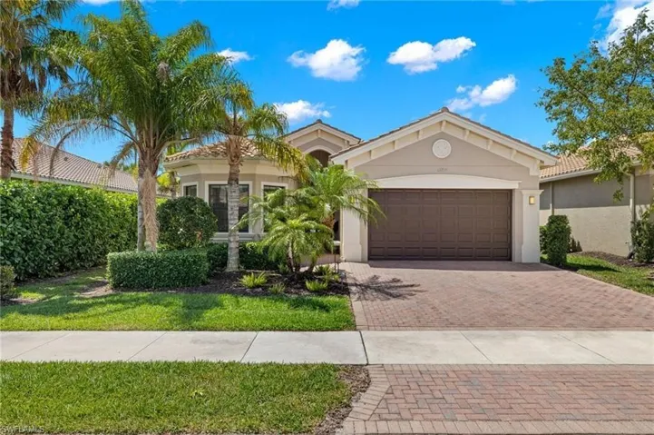 View of front of property featuring a garage