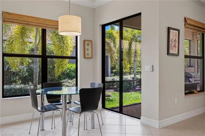 Dining room featuring light tile floors