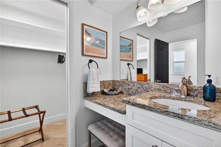 Bathroom featuring vanity and light tile patterned flooring