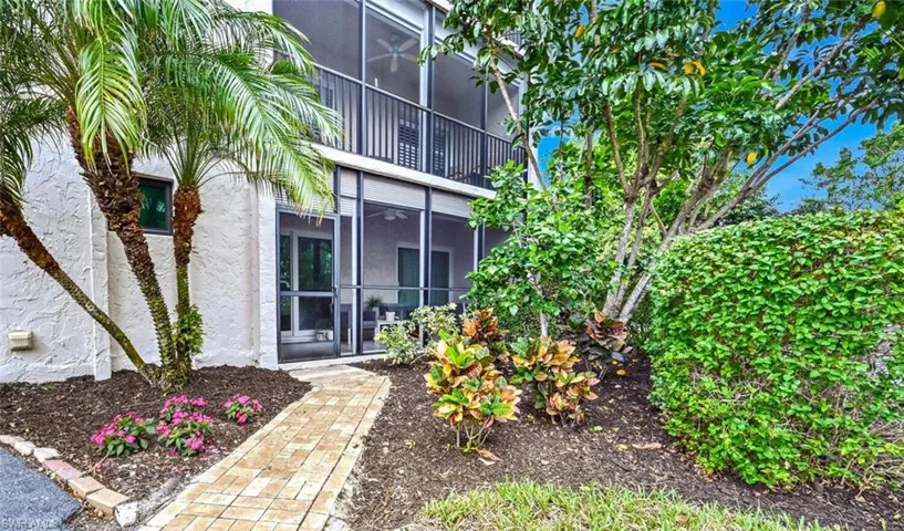 Walking through garden area to lanai