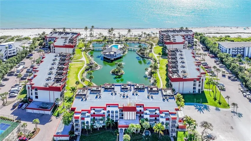 Bird's eye view of a nearby body of water and apartment complex