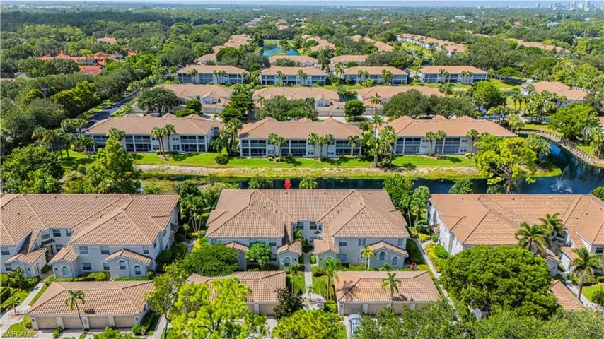 Aerial view of residential area with a nearby body of water