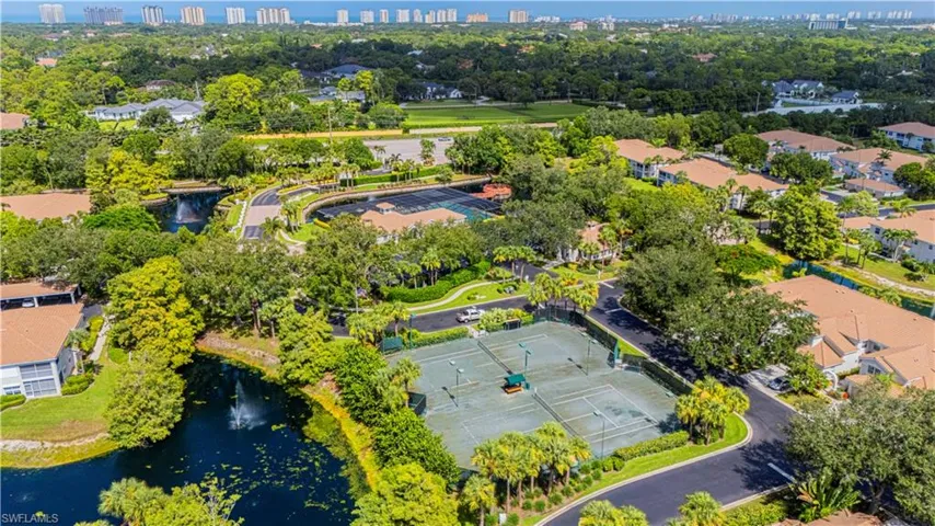 Bird's eye view of skyline and a nearby body of water
