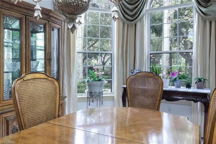Stunning dining room with bay window, plenty of natural light and views of the front landscaping.
