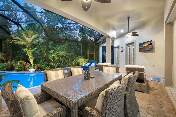 Beautiful view of the pool dining area at sunset, a perfect spot for a dinner with friends and family.