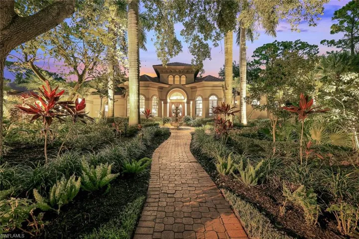 View of the front of the home at sunset.