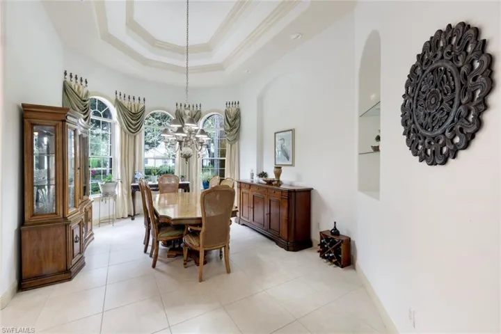 Stunning dining room with bay window, plenty of natural light and views of the front landscaping.