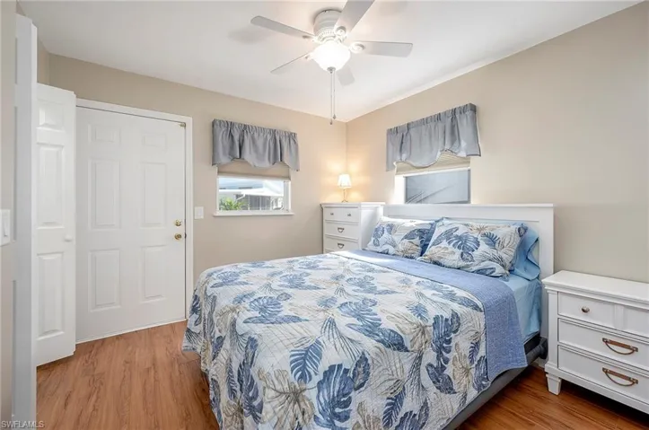 Bedroom featuring ceiling fan and wood finished floors