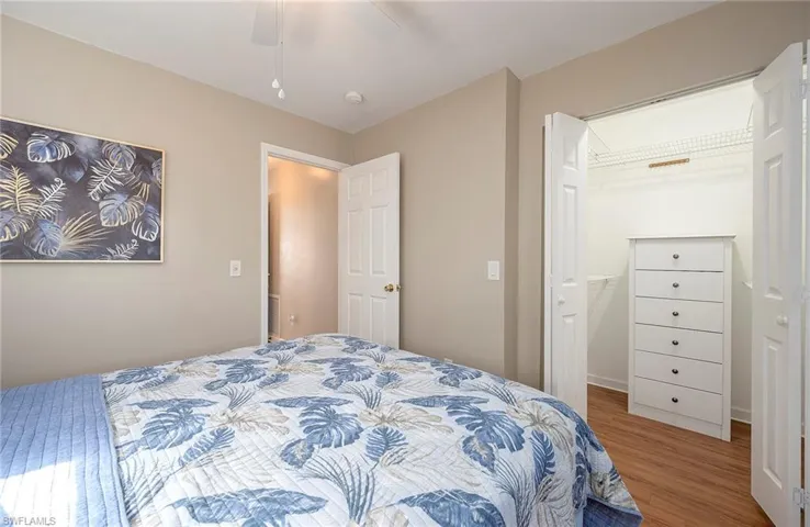Bedroom featuring a ceiling fan and wood finished floors