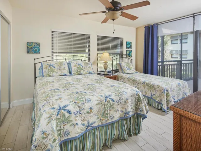 Guest bedroom tucked privately away from primary bedroom.