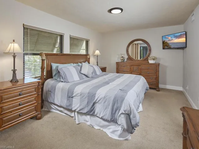 Primary bedroom with access to the lanai.