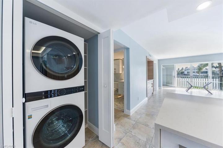 Full size washer and dryer inside the unit
