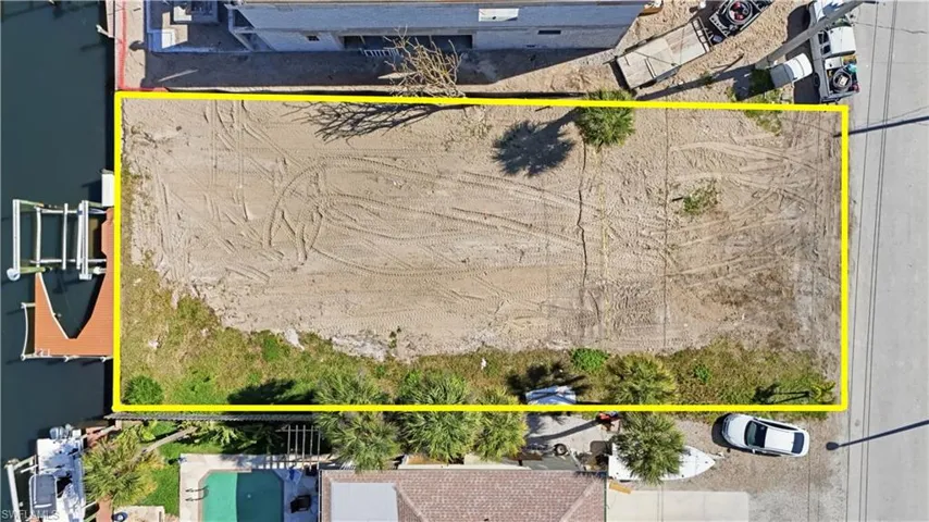 Aerial view of property's location featuring property boundaries highlighted - Virtually Edited Image