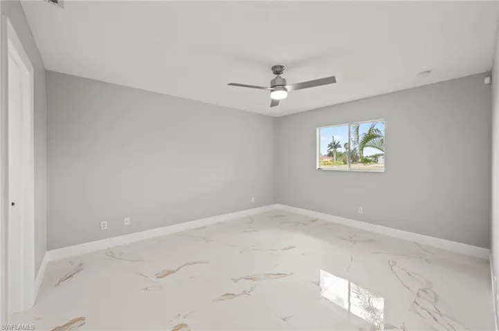 Unfurnished room with ceiling fan